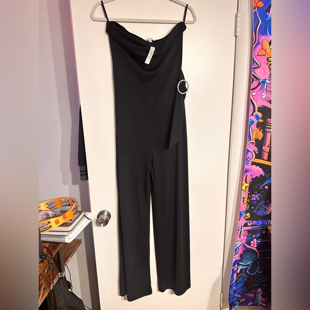 White House Black Market Black Strapless Jumpsuit. With sparking waist tie.